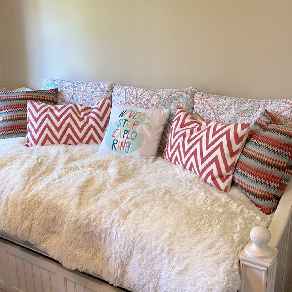 Entire set of pillows for daybed. $10 per pillow. Discounts for bundling.